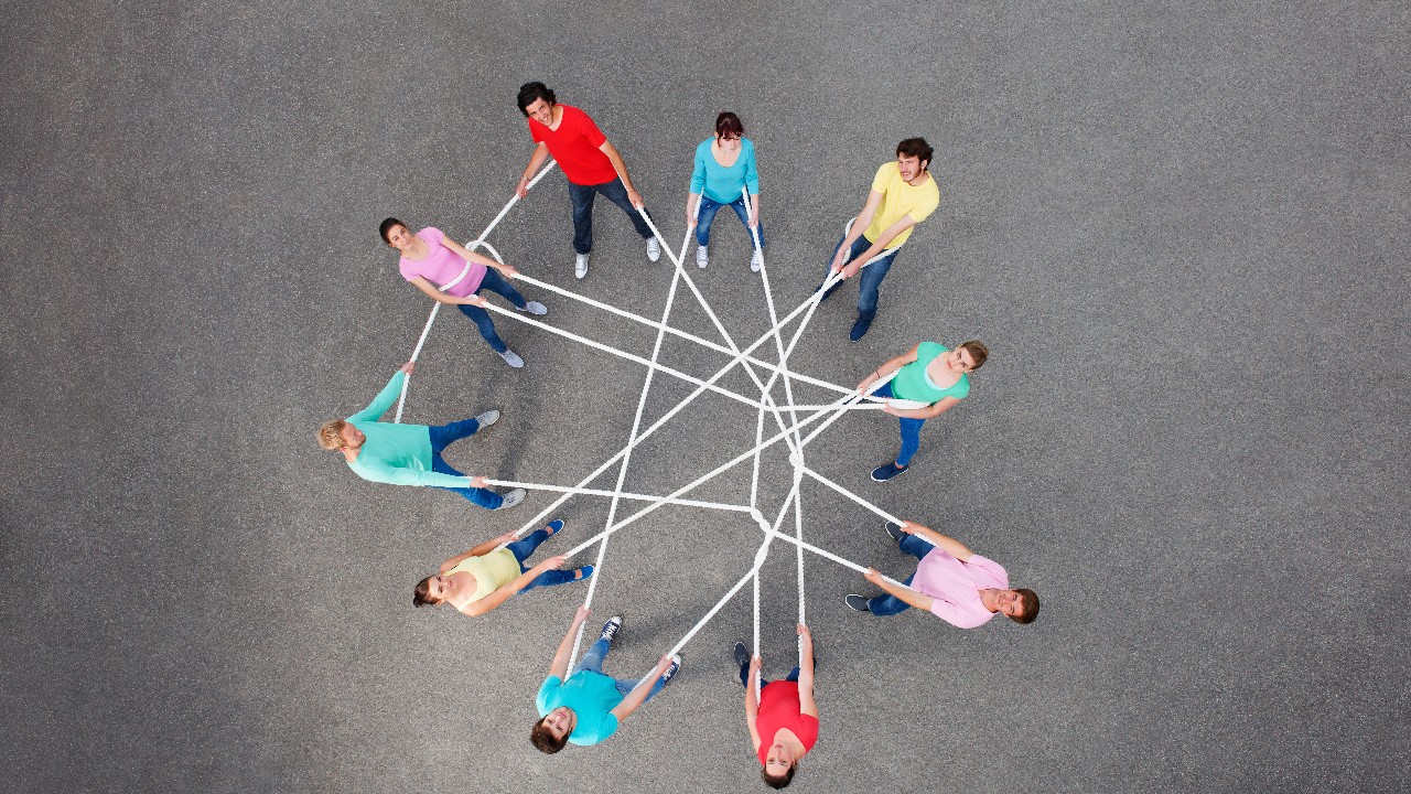 Team bildet Netz - Zusammenhalt